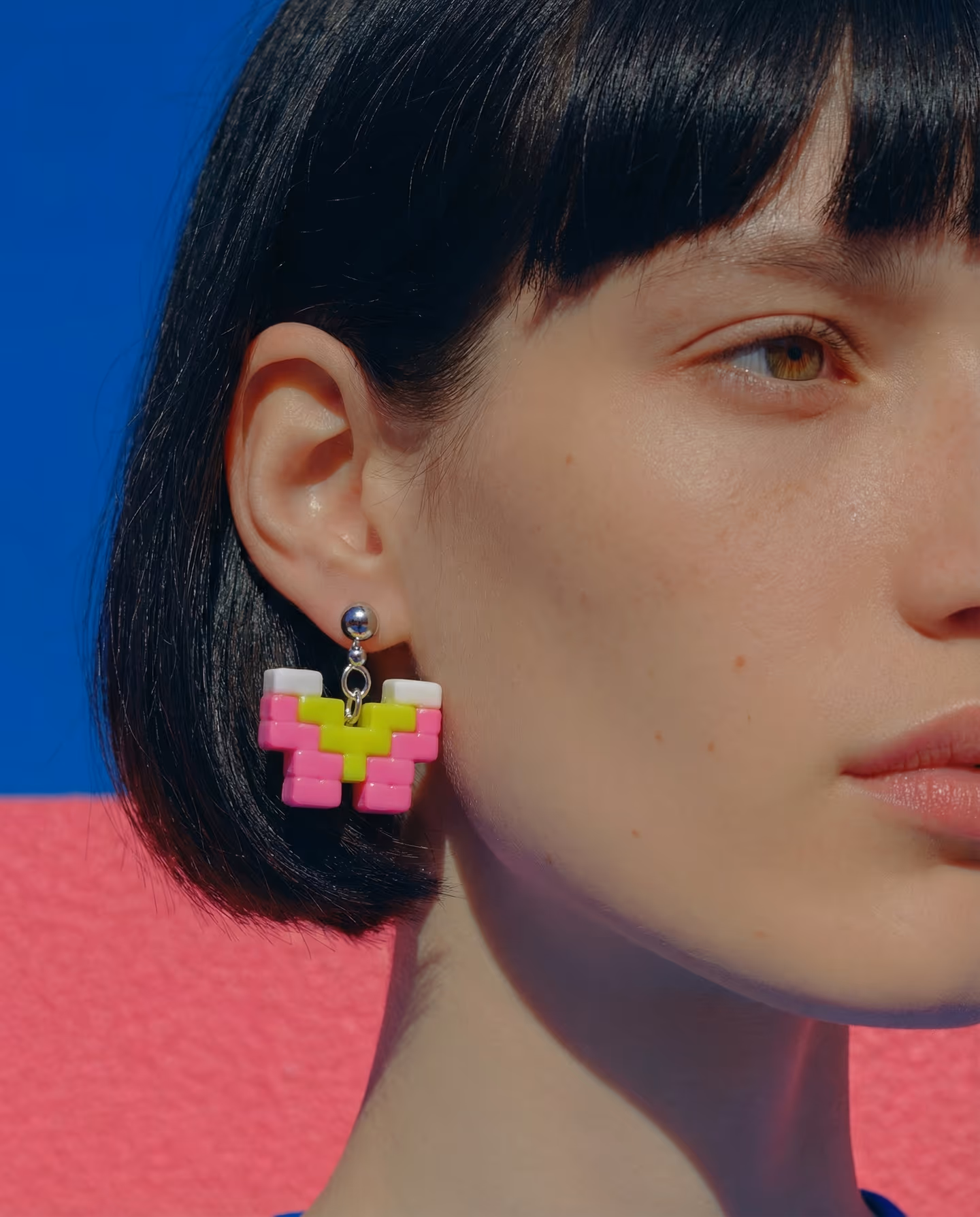 Pink and Yellow Chunky Pixel Butterfly Drop Earrings in styled context. Start with one full butterfly blank and cut it twice from the same template, because the pair reads as mirr…