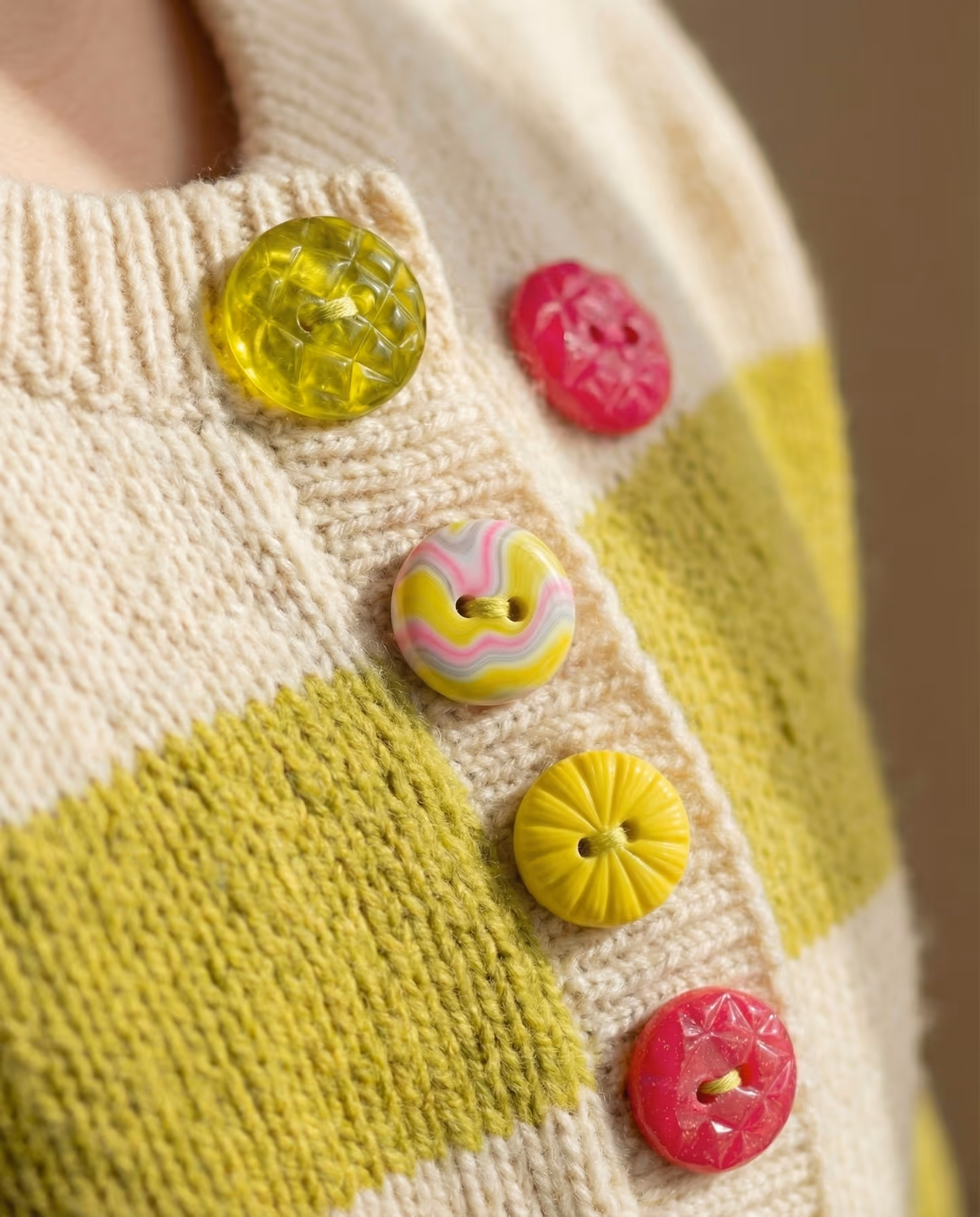 Chartreuse, Pink, and Yellow Mixed Glossy Button Set in styled context. Build one matched family of flat button blanks first, then give each face its own carved, ribbed, or swirle…