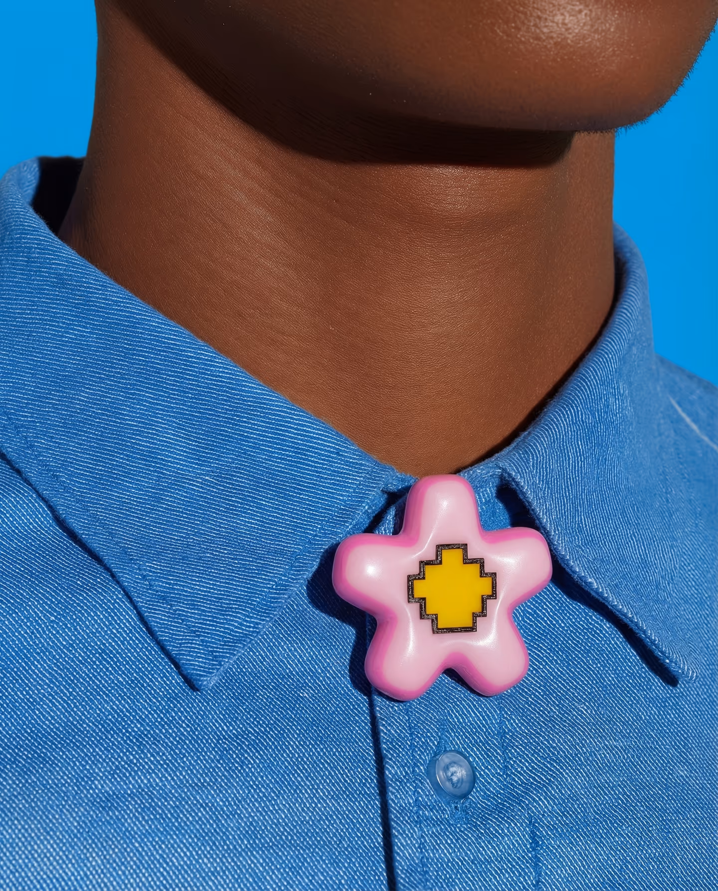 Pink Rounded Pixel Flower Brooch in styled context. Build this as one rounded flower plaque with a stepped center, not as separate puffy petals. The product and collar photos show…