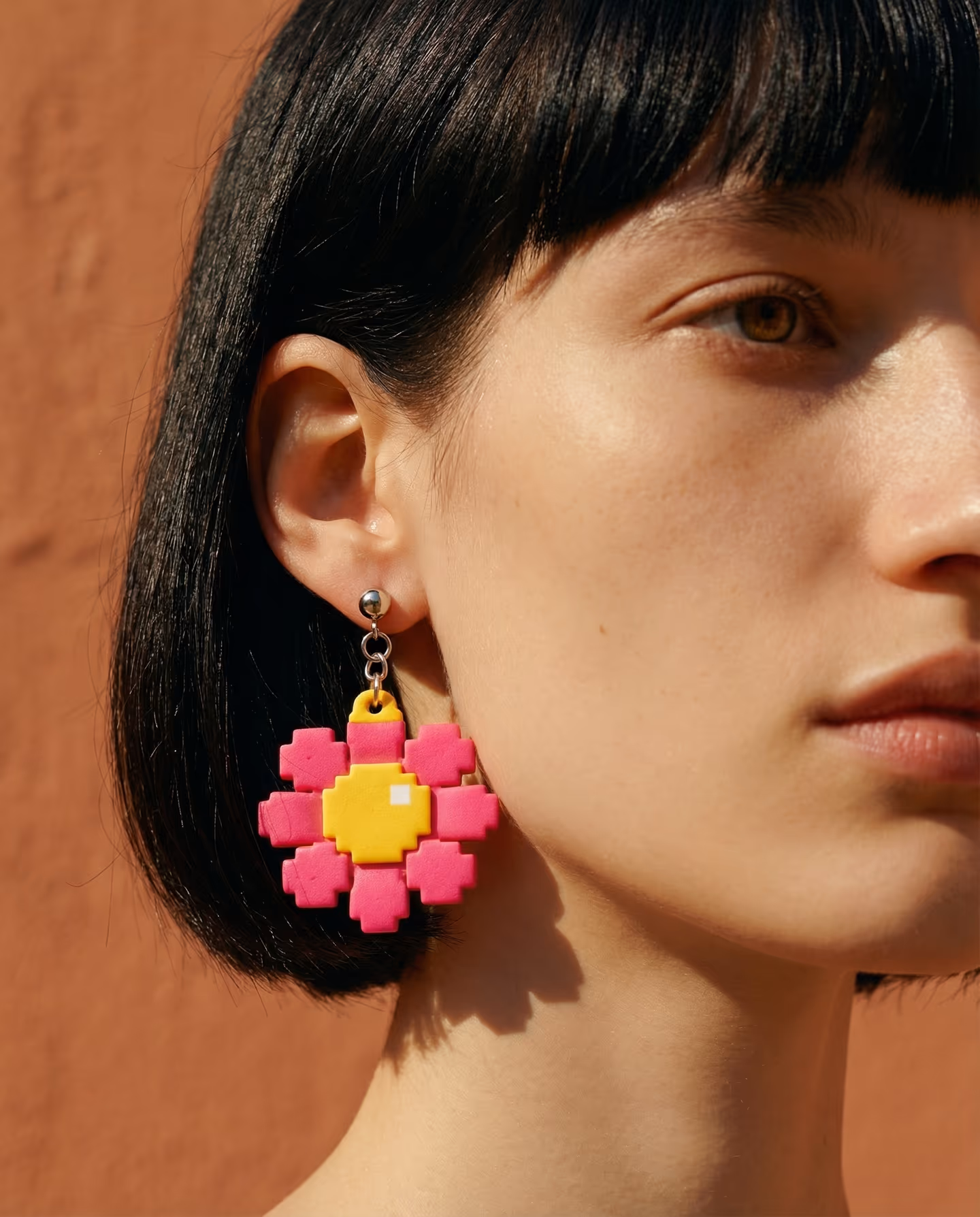 Hot Pink Pixel Flower Earrings in styled context. Start with one flat hot-pink flower blank and keep the little top hanging cap separate from the yellow center, because the pair r…
