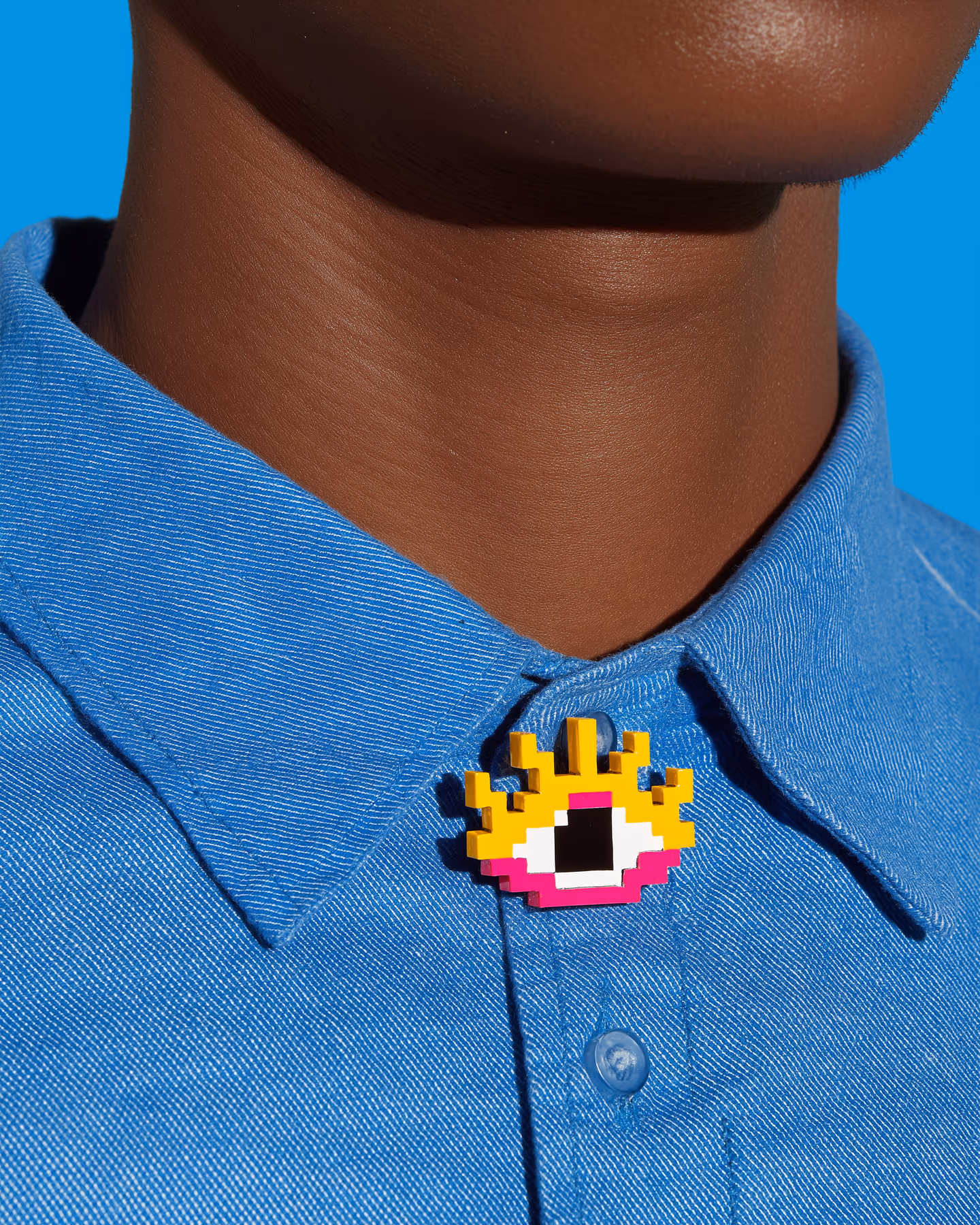 Yellow Pixel Eye Brooch in styled context. Start with one thick yellow eye plaque and cut the whole stepped silhouette first, because the pair reads like a layered pixel badge rat…